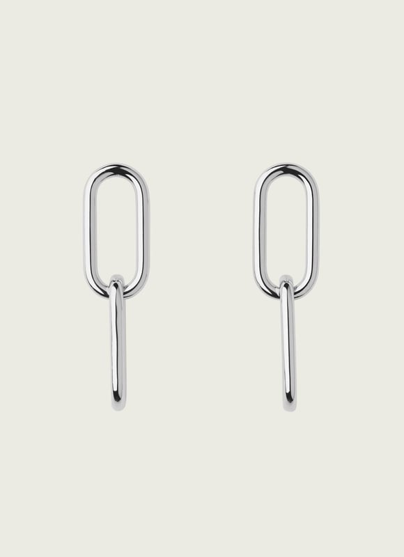 Sleek, stylish and understated, our Lily earrings are a chic addition to our jewellery collection this spring. Crafted from silver-tone brass, they are a long style of two interlocking links with a simple post and butterfly back fastening. Wear them to dress up simple tees or with your favourite dresses when the season's occasions are in full swing.