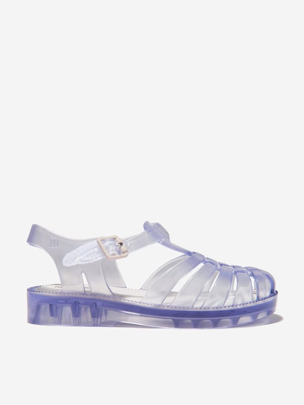 Get them summer ready with these sandals from Mini Melissa. Features a logo embossed at outer side, pin-buckle fastening and velcro strap at ankle for easy wear and a foam rubber footbed for a comfortable fit.