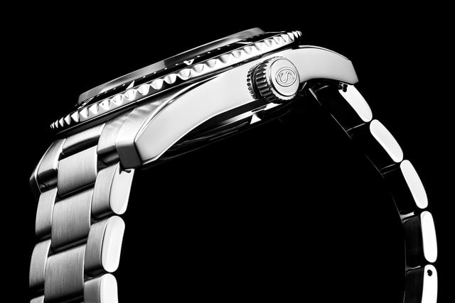 Men's Automatic Dive Watch, Stainless Steel Case with ceramic-like bezel, turquoise dial, Day and Date.