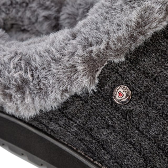 Womens Skechers Keepsakes Ice Angel Slippers in charcoal.<BR><BR>Slip on casual comfort clog slipper.<BR>- Soft cable rib knit upper.<BR>- Plush faux fur topped insole and collar trim.<BR>- Slip on design with lowered back for easy on-off.<BR>- Heel pull on tab.<BR>- Metal BOBS brand tab to side.<BR>- Memory Foam cushioned comfort insole.<BR>- Flexible rubber indoor - outdoor traction outsole.<BR>- 1in built in heel.<BR>- Textile upper and lining  Synthetic sole.<BR>- Ref: 31204-CCL
