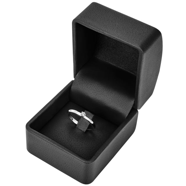 Simple and noble: This classic engagement ring from Tresor 1934 is perfect for all women who love high -quality materials and minimalist design. The narrow ring splint made of a protected 925 sterling silver stages a sparkling diamond with 0.05 carat. An elaborate brilliant cut with 57 facets ensures sensational sparkle. Apart and at the same time suitable for everyday use, the version is: inspired by the popular look of a clamping ring, the ring rail is continued almost invisibly, so that the diamond is firmly anchored. An enthusiastic "yes" with the marriage proposal is certain!