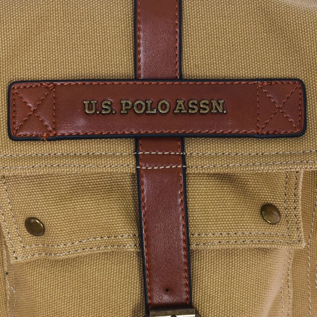 Men's shoulder bag from the U.S. POLO ASSN brand.
 Synthetic material exterior.
 Magnet and zipper closure.
 Front exterior: One pocket with magnet closure.
 Exterior sides: One pocket on each side with magnet closure.
 Front interior: Two open pockets.
 Back interior: One zipper pocket.
 Adjustable strap with brand print.
 Interior lining with brand print.
 Brand logo on the front.
 Measures: 27x29x12.5cm
 Composition: 90% Fabric, 10% Polyurethane
 Care:
Clean with a wet cloth.