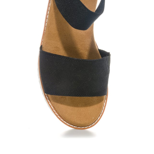Women's Skechers BOBS Desert Kiss Sandals in Black Womens Skechers BOBS Desert Kiss Sandals in black. Strappy casual comfort sandals.- Soft and smooth durasuede fabric upper.- Bandage strap to front with perforated detail.- Elasticated instep ankle strap for flexible comfort.- Slingback ankle strap with hook and loop fastening for a custom fit. - Smooth fabric strap lining. - Memory Foam cushioned comfort insole.- Durasuede wrapped low wedge midsole with perforated detail. - Flexible traction outsole. - Wedge height: 3cm (1.25“) approximately.- Textile upper and lining Synthetic sole. - Ref: 31440-BLKMeasurements are intended for guidance only.
