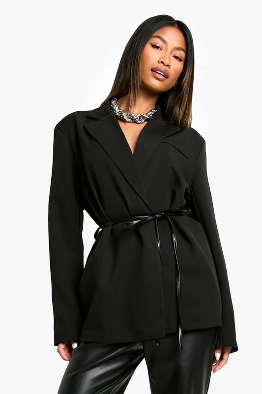 Marl Shoulder Pad Belted Blazer Structured shoulder pads for a bold silhouette
Slim fit design for a sleek, modern look
Belted waist to accentuate your figure
Collared neckline adds a touch of sophistication
Versatile piece suitable for various occasions
Make a statement with this chic blazer that combines style and versatility. The structured shoulder pads create a bold, confident silhouette, while the slim fit design ensures a flattering, contemporary look. The belted waist allows you to customise the fit, emphasising your curves in all the right places. Perfect for a night out on the town, this blazer can be styled with wide-leg trousers and statement jewellery for a head-turning ensemble. Alternatively, dress it down with skinny jeans and ankle boots for a more casual yet polished look. Whether you're heading to a trendy bar or meeting friends for drinks, this blazer will help you radiate confidence and style. Its versatility makes it a must-have addition to any fashion-forward wardrobe, easily transitioning from day to night with a simple change of accessories.
