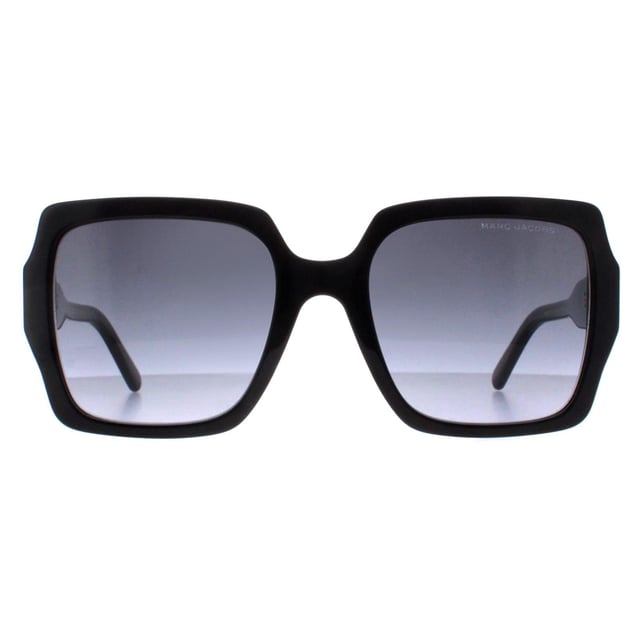 Marc Jacobs Cat Eye Womens Shiny Black Dark Grey Gradient MARC 731/S  Sunglasses are crafted with precision and finesse, the frame embodies a sleek yet distinctive silhouette, showcasing premium materials that guarantee both durability and comfort. The lenses, known for their superior quality, offer not just a fashion statement but also optimal protection against harmful UV rays. Emblazoned with the signature Marc Jacobs detailing, these sunglasses encapsulate refined style and timeless appeal, making them a quintessential choice for those seeking to effortlessly elevate their look with a touch of luxury and sophistication.