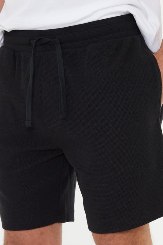 Unwind in ultimate comfort with this three pack of textured cotton pyjama shorts from Threadbare. These shorts are made from a soft touch cotton waffle fabric, feature an elasticated waistband with adjustable drawcords that make them comfy and easy to wear, and have two handy side pockets. Whether you plan on sleeping in them or relaxing on the sofa, these loungewear shorts are ideal.