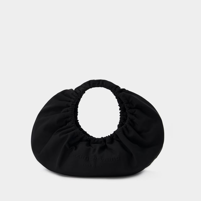 Un asa. Doble asa de transporte. Material: 100% nailon. Forro: nailon. Colores: NEGRO - Negro. Nylon. Cierre: superior abierto. Width: 10. Height: 45. Length: 39.