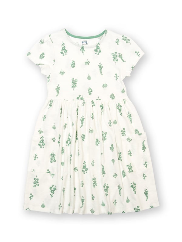 100% organic cotton | Proud to be certified to the Global Organic Textile Standard (GOTS) | Wildflower all-over print | Cream | Slub jersey (170-180 gsm) | Coconut button shoulder opening (up to and including size 3 years) | Side patch pockets | Short sleeved | Round neck | Made in Turkey | Machine washable at 40 degrees, or at 30 degrees to be kinder to the planet