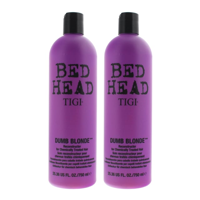 Tigi Bed Head Dumb Blonde Conditioner is a conditioner that has been designed to leave hair feeling revived and nourished. The conditioner is packed with proteins which helps to balance the pH of the hair and deeply penetrates the hair to inject hydration and strength. The conditioner is intense but but the formula is lightweight and delicate to fragile hair, protecting it, thickening it and repairing it. The formula contains Keratin amino acids, soybean protein and pro Vitamin B5, which work to moisturise, repair and condition the hair.