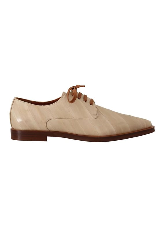 Marca: Dolce & Gabbana.
  Modelo: Pisos formales.
  Color: Beige.
  Material: 100% cuero de anguila.
  Suela: Cuero.
  Cierre: Con cordones.
  Detalles del logotipo.
  Alta calidad y comodidad.
  Fabricado en Italia.