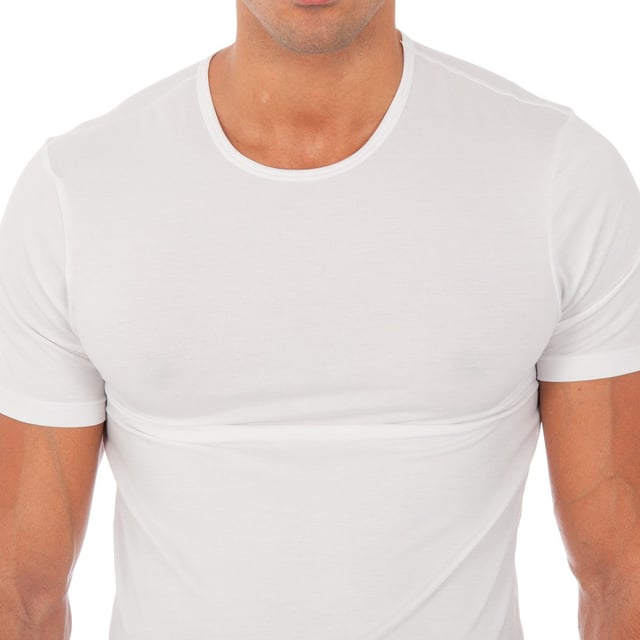 Camiseta Innovación.
Manga corta.
Cuello redondo.
Algodón Termal Tech, que genera y retiene el calor corporal.
Tejido liso, muy suave y cómodo.
Prenda que se ajusta perfectamente al cuerpo.
Etiqueta de tela con el nombre de la marca, en el lateral inferior.
Costuras vistas a tono.

Composición:  40% Acrílico, 34% Poliéster, 21% Viscosa, 5% Elastano

Lavar a mano a temperatura máx. 40º.
No utilizar lejía.
No permite el uso de secadora.
Planchar a temperatura máx. 130º.
No lavar en seco.