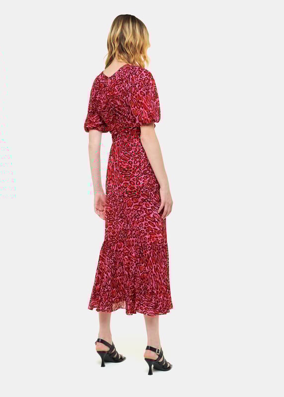 Designed in a vivid shade of pink with a statement leopard print and voluminous sleeves, this dress is sure to make a statement. Add boots and a leather jacket for the ultimate sleek finish come autumn.