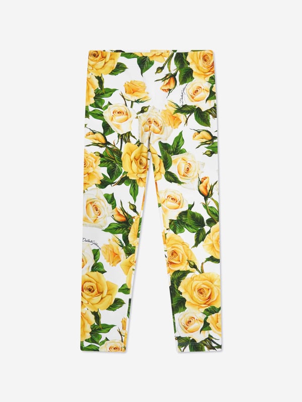 Dolce  Gabbana incorporate innovative materials with vintage abstracts into coexisting spaces. These girls rose leggings capture the Italian label's mesmeric craftsmanship and purity of design. As part of the girl‚ flowering collection, each piece is depicted in a veritable riot of yellow roses. Presented as interlock leggings with all-over yellow rose print. She will look and feel divine.  Made in Italy Multi-Coloured Regular Fit Stretch Waistband Placed Print Inner Leg: 47cm on Size 6 Years Hem: 10cm on Size 6 Years Print Placement Will Vary Due to  Aspect  External Composition: 90% Cotton, 10% Spandex