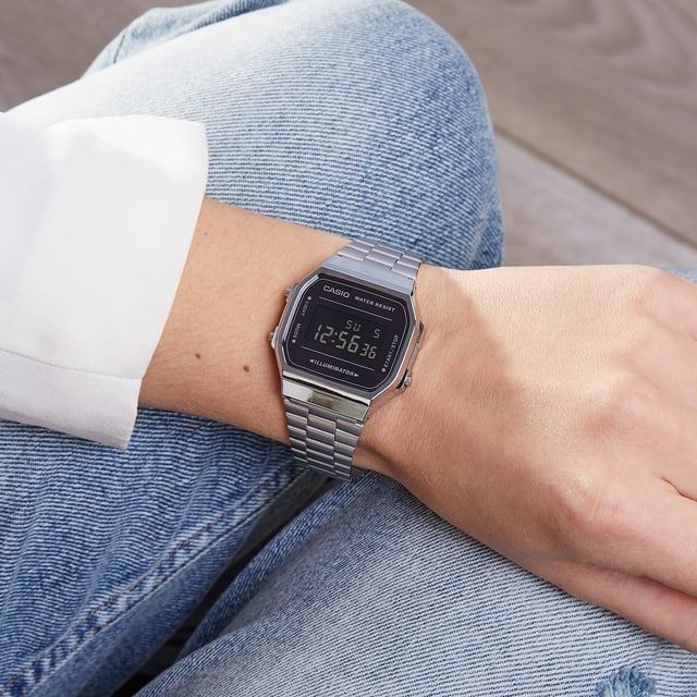 This Casio Casio Retro Digital Watch for Unisex is the perfect timepiece to wear or to gift. It's Silver  Square case combined with the comfortable Silver Stainless steel watch band will ensure you enjoy this stunning timepiece without any compromise. Operated by a high quality Quartz movement and water resistant to 3 bars, your watch will keep ticking. This is a perfect sporty and casual watch for you, it's a great gift for family or friends -The watch has a calendar function: Day-Date, Stopwatch, Alarm, Light High quality 19 cm length and 15 mm width Silver Stainless steel strap with a Fold over clasp Case diameter: 35 mm,case thickness: 9 mm, case colour: Silver and dial colour: Black