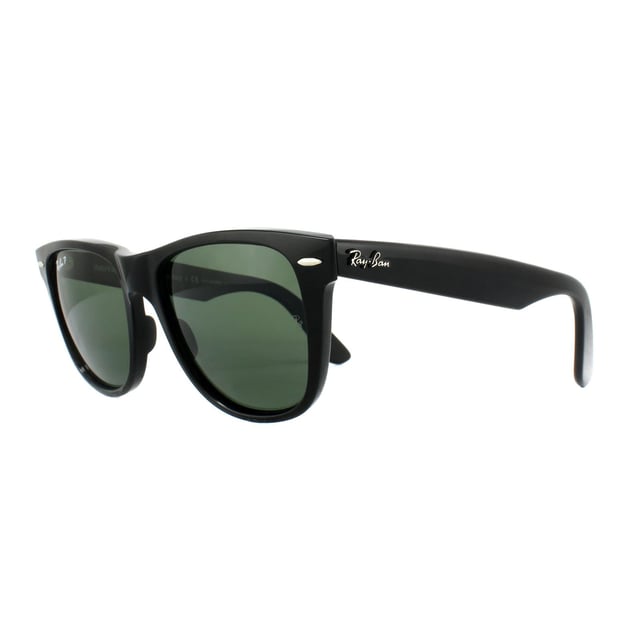Ray-Ban Sunglasses Wayfarer 2140 901/58 Black Green G-15 Polarized Medium 50mm are one of the most recognisable and bestselling sunglass styles worldwide and are enormously popular among celebrities, musicians and artists. The distinctive angled design and thick frame are sure to make a statement and Ray-Ban are constantly using vibrant colours and patterns to update this classic and popular style. The lightweight acetate frame is comfortable and the Ray-Ban logo is displayed on the corner of the lens in addition to the sculpted winged temples.