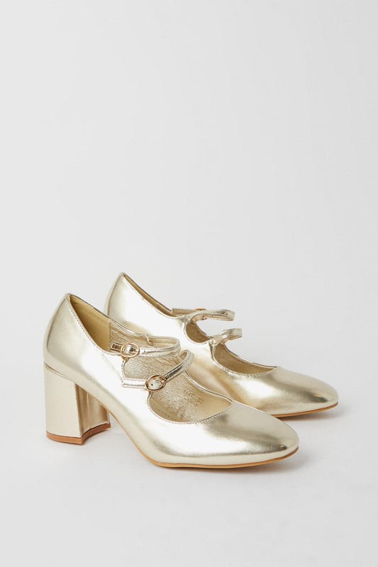High-shine metallic finish
Block heel for stability  
Almond toe shape
Double Mary Jane straps with buckles
Reinforced heel cap for durability

These versatile metallic court shoes from Dorothy Perkins are perfect for both day and evening wear. Their contemporary double strap design with silver-toned buckles lends visual interest, while the mid-height block heel offers comfort and stability. 

Pair with cropped trousers or a flared skirt for a smart daytime look. For evenings out, match with a dress or trousers to complement the metallic shine. The reinforced heel cap gives durability for all-day wear. With their sleek silhouette and modern accents, these shoes will become a go-to in your wardrobe.
