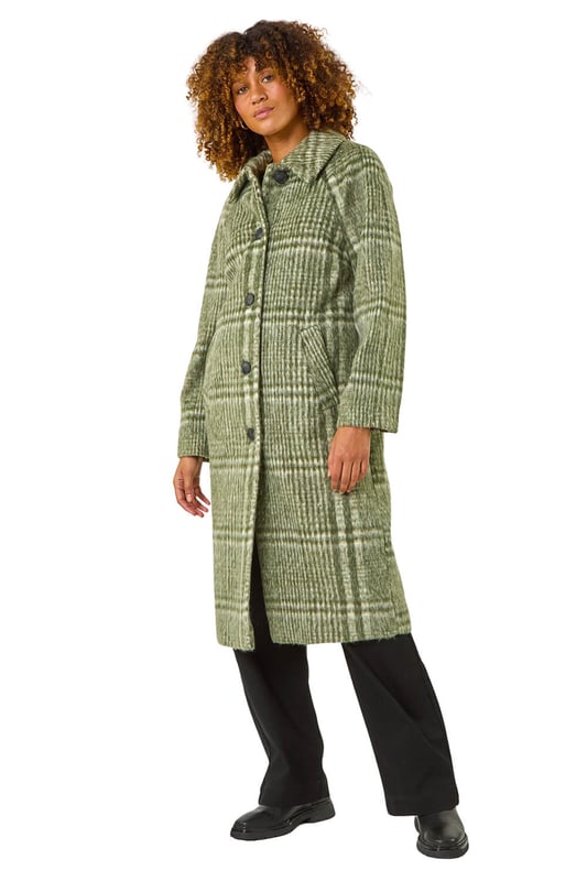 Brush Check But Coat from Roman. Wrap up in style this Autumn Winter with our trendy brushed check print coat. The front button opening adds a classic touch, while the side welt pockets are both practical and stylish. Designed with a collar and rever style, this coat features long raglan sleeves for a comfortable fit. Crafted from a comfortable woven fabric and fully lined for extra warmth, this coat is versatile and on-trend. Perfect for layering throughout the seasons, pair with trousers and boots for a smart style statement.