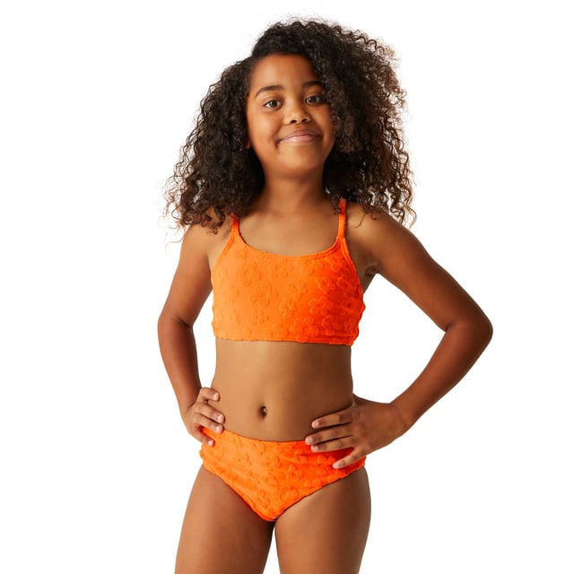 Regatta Girls Dakaria II Floral Bikini Set (Satsuma) 96% Polyester, 4% Elastane. Fabric: Stretch, Towelling. Design: Floral, Raised Texture. Fastening: Pull-On. Neckline: Scoop. Fabric Technology: Durable. Contents: 1 Swim Shorts, 1 Swim Top. Please Note: Light Foam Cups In Sizes 13yrs+. Sustainability: Made from Recycled Materials. Sleeve-Type: Sleeveless. Sun Rating: UPF 50+.