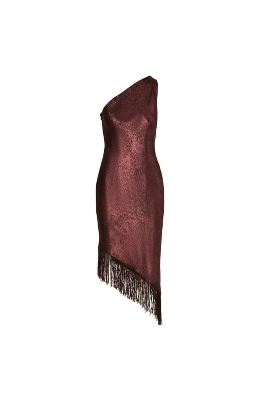 Shimmy into some sparkle and step out in this one shoulder fringe dress. This cocktail dress features a one shoulder neckline with a pleated design, fitted silhouette, and an asymmetrical mid-length skirt hem. Crafted from foiled chiffon fabric, this dress has no waist seam and is accented with metallic fringe at the hem. Cut on the bias for a figure-skimming look, this party dress has a side zipper closure. Styled with nude heels and metallic jewellery, this one shoulder dress will make any cocktail or formal event even more magical.