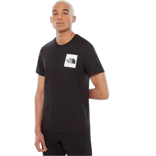A classic The North Face crew neck t-shirt, the Men’s Fine Short Sleeve Tee is a summer essential. Made from 100% cotton, it is soft and comfortable against the skin, with a ribbed crew neck that ensures it’s easy to layer. A water-based box logo on the chest and a small logo on the back right shoulder complete the understated look.