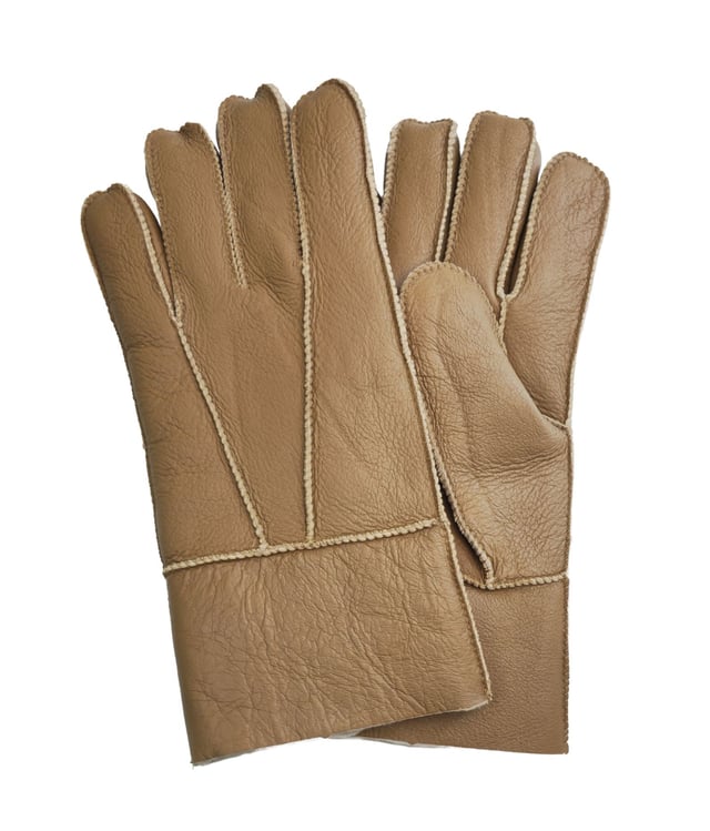 Experience luxurious warmth and timeless elegance with Infinity’s Unisex Super Soft Sheepskin Gloves. Crafted from premium quality sheepskin, these gloves provide unmatched softness and comfort, wrapping your hands in cozy warmth. The refined stitch detailing adds a subtle touch of sophistication, making them a versatile accessory for any occasion.
Available in a range of classic colours, these gloves seamlessly complement your wardrobe and enhance your style. With multiple sizes to choose from, you’ll find the perfect fit for ultimate comfort and flexibility. Blending traditional craftsmanship with modern functionality, Infinity’s Unisex Super Soft Sheepskin Gloves ensure both protection and style, so you can step out confidently, knowing you're wearing the finest quality gloves.
Sizing and Fit
These gloves may feel snug initially, but with a few hours of wear, the lambskin will naturally stretch and conform to your unique fit.