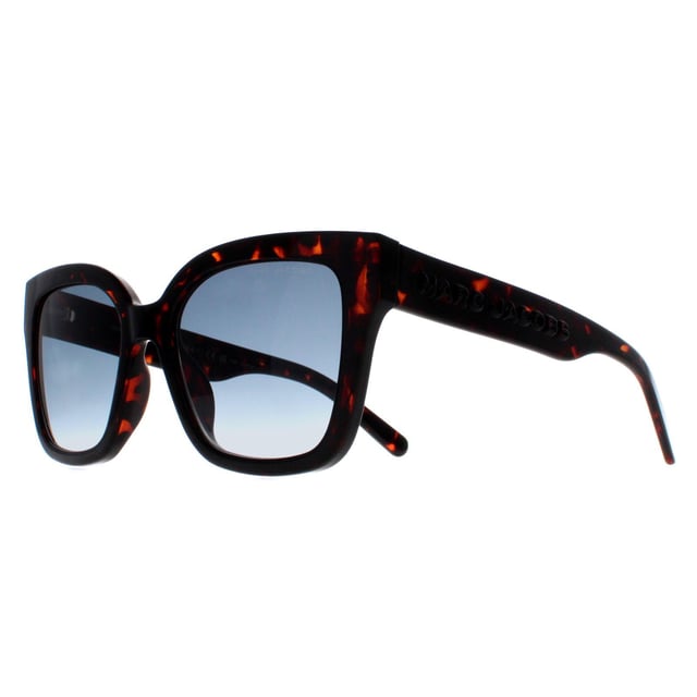 Marc Jacobs Square Womens Shiny Dark Havana Blue Gradient MARC 658/S  Sunglasses feature a sleek and contemporary design with a nod to timeless style. Crafted with meticulous attention to detail, the frame showcases a blend of modern lines and classic elements, complemented by high-quality materials that promise both durability and comfort. The lenses not only offer optimal protection against harmful UV rays but also contribute to the sunglasses' undeniable allure. Finished with the iconic Marc Jacobs branding, these sunglasses effortlessly merge fashion forward aesthetics with everyday functionality, becoming an essential accessory for those who appreciate tasteful design and impeccable quality.