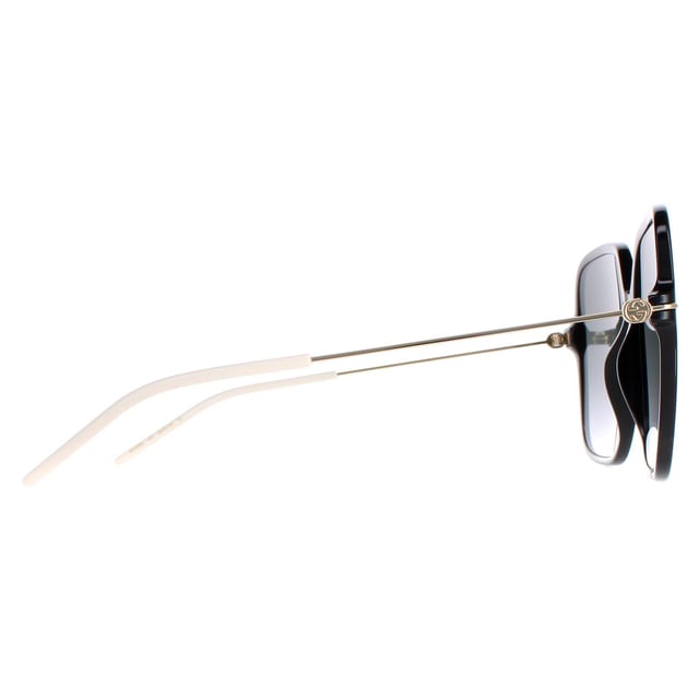 Las gafas de sol Gucci GG1267S 001 negro brillante y gris dorado degradado son un accesorio atrevido y a la moda que hará una declaración allá donde vayas. Estas gafas de sol presentan un exclusivo diseño de montura cuadrada fabricada con una ligera montura de acetato. El emblemático logotipo de Gucci destaca en las patillas, añadiendo un toque de lujo a este diseño ya de por sí sofisticado. Ya estés haciendo recados, tumbada en la playa o vistiéndote para salir por la noche, estas gafas de sol Gucci GG1267S te ayudarán a destacar entre la multitud.