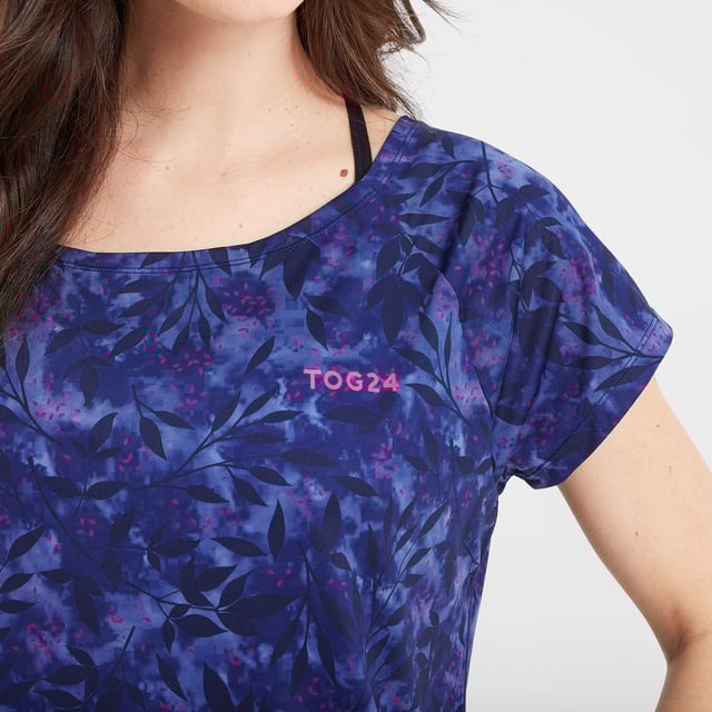 Made to keep you cool as you move, our Halsam is a lightweight, breathable technical top for women. The supersoft, quick-wicking fabric moves moisture away from your skin, so you never feel damp and clammy. Team with leggings and put Halsam's 4-way stretch construction to the test as you limber up at pilates, feel the burn at zumba, or stretch it out at yoga. Cut to flatter every shape and size, the gently curving hemline is slightly longer at the back for extra coverage and a more confident workout. Featuring raglan short sleeves and gorgeous crossover strap detailing at the back, Halsam effortlessly takes you from the yoga studio to coffee with your friends in style. Beautifully finished by our team in West Yorkshire where this performance top was designed, a discreet TOG24 logo printed on the chest underlines our ethos of 'Truth Over Glory'.