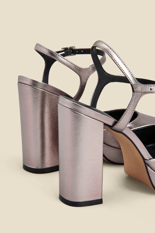Platforms are back
You won't believe how comfy they are
Luxe metallic leather - they're made for dancing
Closed toe means no pedi needed
Style with a silky blouse and flared jeans
Pair with a dress for weddings and parties