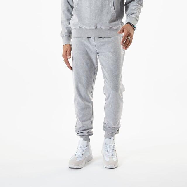﻿'POLAR TECH'

Description:

The Slub Joggers in Grey with contrast drawstring. Complete the set with slub hoodie in Grey.


Details:

Grey
Front Logo on the pocket
Ribbed hem and cuff
Composition & Care:

100% cotton.
Machine wash according to care label instructions.

Fit:

Regular
Model is 6ft and wear size M