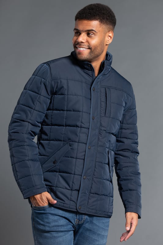 Stay warm and stylish with this square-style padded jacket from Kensington Eastside, featuring a button and zip-up fastening for ultimate comfort. With a funnel neck and two front pockets, this jacket is perfect for keeping your essentials close by. Ideal for outdoor adventures or casual wear, it's a must-have addition to your wardrobe this season.