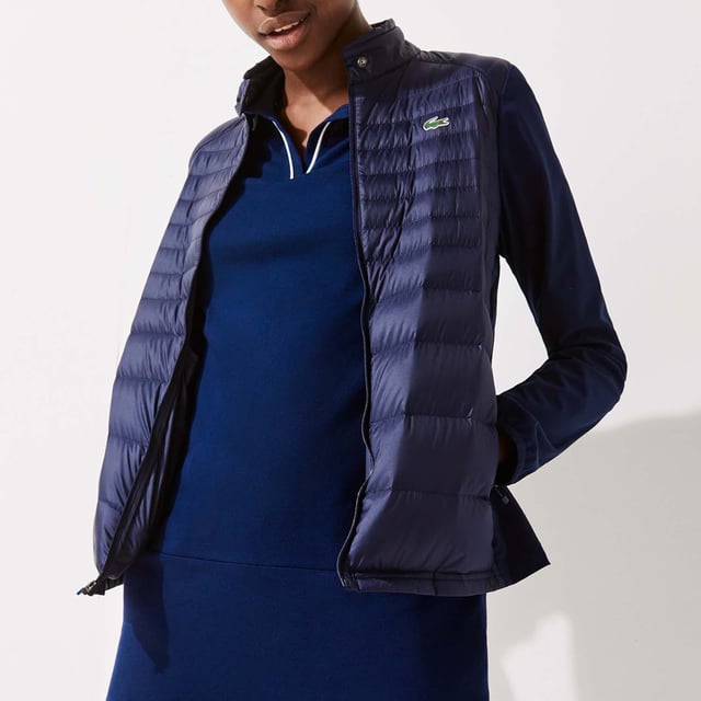 Women's Lacoste SPORT Down Technical Golf Jacket- Buttoned stand-up collar- Lightweight  water-resistant technical mini ripstop fabric with feather and down quilting- Zip side pockets- Stretch panels on sides and elasticised accents on sleeves - Green crocodile transfer on chest- Ref: BF9267-423