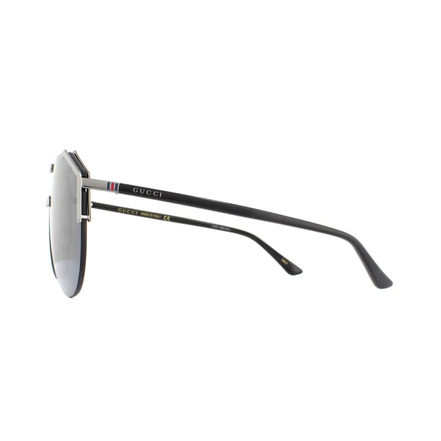 Gucci Sunglasses GG0584S 001 Ruthenium and Black Grey are a bold design featuring one visor aviator shaped lens. Crafted from metal and plastic with adjustable nose pads for comfort. The interlocking GG logo is located front and centre with the Gucci text logo on each temple.