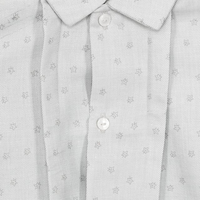 Long-sleeve shirt.
 Lapel collar.
 Button closure on the front.
 Button closure cuffs.
 Flared cut.
 Seams seen in tone.
 Composition: 56% Cotton, 44% Polyester
 Care:
- Wash maximum at 30ºC.
 - Iron at medium temperature, max. 110ºC.
 - It is not allowed to use a dryer.
 - Do not use bleach.
 - Does not support dry cleaning.