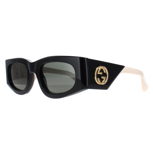 Gucci Rectangle Womens Black with Ivory Grey GG1664S  Sunglasses boast an elegantly oversized silhouette with sharp, clean lines and a touch of retro charm. The sophisticated frame is accentuated by Gucciâ€™s iconic double-G logo on the temples, symbolizing luxury and fine craftsmanship. Equipped with premium lenses that provide superior UV protection, the GG1664S ensures both style and functionality. Available in a variety of striking color options, these sunglasses are perfect for fashion-forward individuals who seek to express their unique sense of style with a touch of timeless elegance.