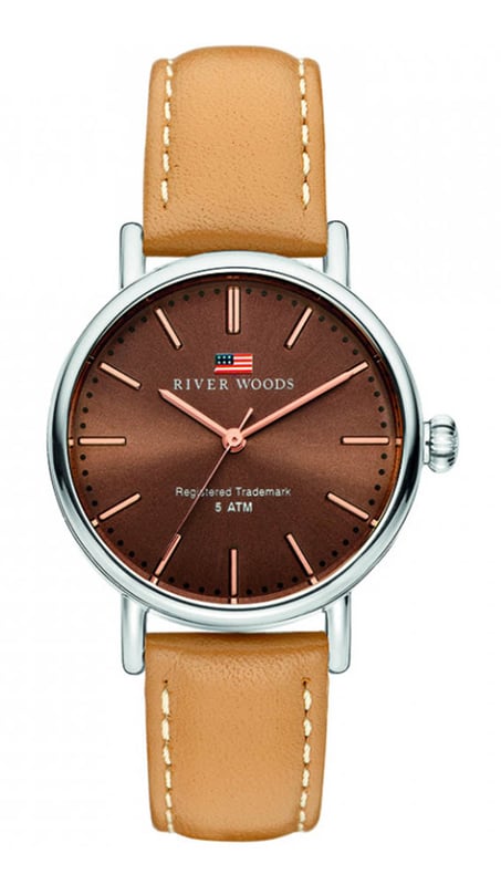 This River Woods Oswego Analogue Watch for Women is the perfect timepiece to wear or to gift. It's Silver 34 mm Round case combined with the comfortable Brown Leather watch band will ensure you enjoy this stunning timepiece without any compromise. Operated by a high quality Quartz movement and water resistant to 5 bars, your watch will keep ticking. Get all the comfort of leather with this leather band -This Analogue watch has a function: Luminous Hand High quality 19 cm length and 14 mm width Brown Leather strap with a Buckle Case diameter: 34 mm,case thickness: 9 mm, case colour: Silver and dial colour: Brown