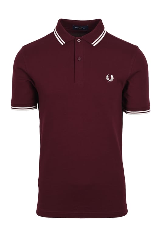 Fred Perry Twin Tipped Polo Shirt Oxblood
The classic twin tipped polo shirt by Fred Perry. In a dark red colourway with contrasting twin tipped detailing to the collar and cuffs it is a standout design. Crafted from cotton pique it is a quality piece comfortable for all day wear and can be easily styled with your favourite denim.

100% Cotton
Short Sleeved
Twin Tipped Collar and Cuffs
Two-Button Plackeet
Regular Fit
Embroidered Laurel Wreath
Style: M3600