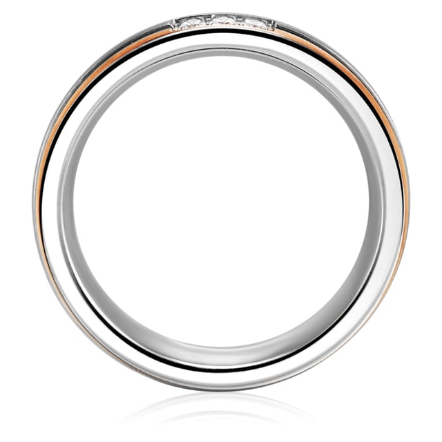 This extraordinary engagement ring of the 1934 manufactory combines all elements that love trend-conscious women: noble materials, durability, bicolor look and a touch of bling bling. The simple stainless steel ring inspires with partial gilding in a trendy rose gold and a fascinating groove contour. Three small zirconia stones in Brillantschliff make the ring sparkle - the perfect symbiosis of minimalism and glamor. It is a great advantage of stainless steel its scratch resistance and robustness at a favorable price, so that this engagement ring is not suitable as a bridal jewelry but also daily companions.