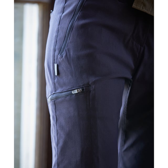 96% Polyamide, 4% Elastane. 170gsm. Design: Plain. Fastening: Button. Belt Loops, Heel Tape, Splashproof, Zip Fly. Fabric Technology: Durable, DWR Finish, EcoShield, Solarshield, Stretch, Sun Protective. Pockets: 2 Side Pockets, 1 Back Pocket. Waistline: Fixed. Sun Rating: UPF 40+.
