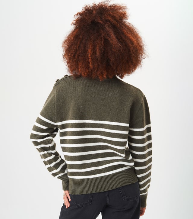 Stay cozy and stylish with ou High Neck Stripe Oversized Jumper. This fashionable sweater features a high neck design and classic stripes, perfect for any fashion-forward individual. The oversized fit adds a touch of trendiness to your wardrobe. Stay warm and look great all season long.MeasurementApprox. length- 75cm