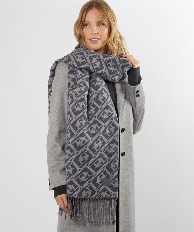 After a new accessory this season? Introducing Luke, a soft scarf to complete all your chilly-day outfits. Featuring an all-over monogram print and playful fringe trim, it's sure to add a cool edge to your cold-weather wardrobe.