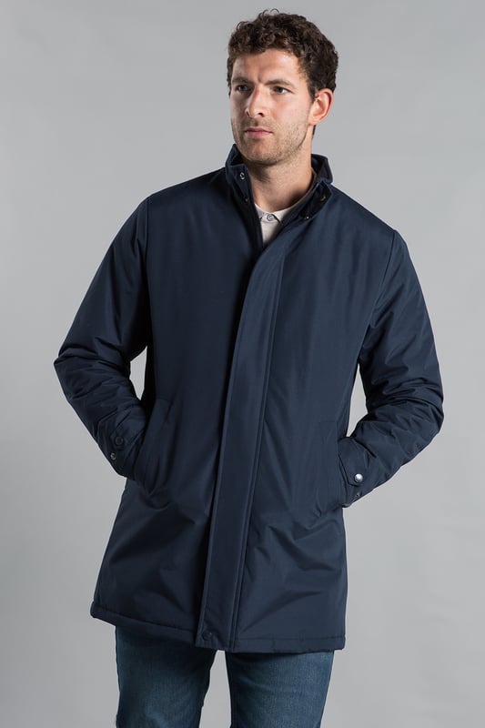 Upgrade your outerwear with Kensington Eastside's mid-length coat. Featuring a funnel neck, zip and button fastening, and a PVC-coated outer, this jacket combines style and durability for any weather.