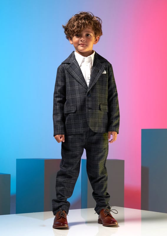 Get ready for your proud parent moment. Your special little person will look incredible in our smart trousers. Perfectly matched to our navy check jacket. I am sustainable - I am recycled Navy About me: 100% Polyester Look after me: think planet. machine wash at 30c.