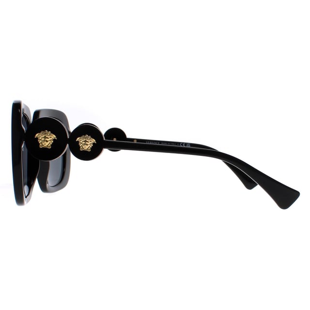Versace Square Womens Black Dark Grey VE4434  Sunglasses are a bold and striking eyewear option that blends modern design with luxury details. With a square frame made of high-quality acetate, these sunglasses feature tinted lenses that provide 100% UV protection. The Medusa head emblem and gold-tone detailing on the temples add a touch of glamour to the design.
