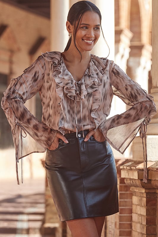 We consider it a wardrobe staple
Crafted from butter-soft leather for ultimate luxury
Cut for a flattering A-line fit
Work, weekend, night out - it's got you covered
Effortless chic with a striped knit and boots
Dress it up with strappy heels and a glam top