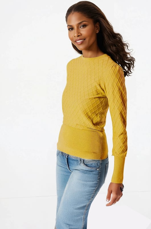 This jumper offers a contemporary twist on classic knitwear. Its modern shape is thanks to the large rib-knit cuffs and subtle diamond stitch pattern.

82% Viscose 18% Polyamide

Diamond Texture Knit
Crew Neck
21" Shoulder to Hem

Long Puff Shoulder Sleeve
Deep Ribbed Cuffs