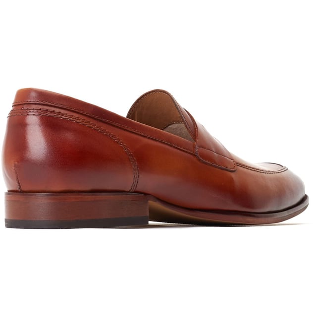 Base London Bruno Leather Men's Burnt Tan Loafers Bruno is a classic men's penny loafer from Base London. Perfect for any smart casual event this summer, Bruno can be dressed up or down and the Ortholite insole provides all-day comfort.