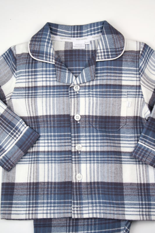 Give your little one a cosy, stylish sleep with our Boys' Traditional Check Cotton Pyjama Set, crafted for comfort and classic appeal. Featuring a timeless checkered pattern, this two-piece pyjama set includes a button-up top with a relaxed fit and elastic-waist bottoms, ensuring easy movement and a snug fit. Made from soft, breathable cotton fabric,  these PJs are designed to keep your child comfortable through every season.
Ideal for parents seeking classic boys' sleepwear or a check pyjama set, this outfit combines heritage charm with modern ease. Perfect for bedtime, lounging, or even as a thoughtful gift, this boys' check PJ set offers durability, comfort, and style in one package.
