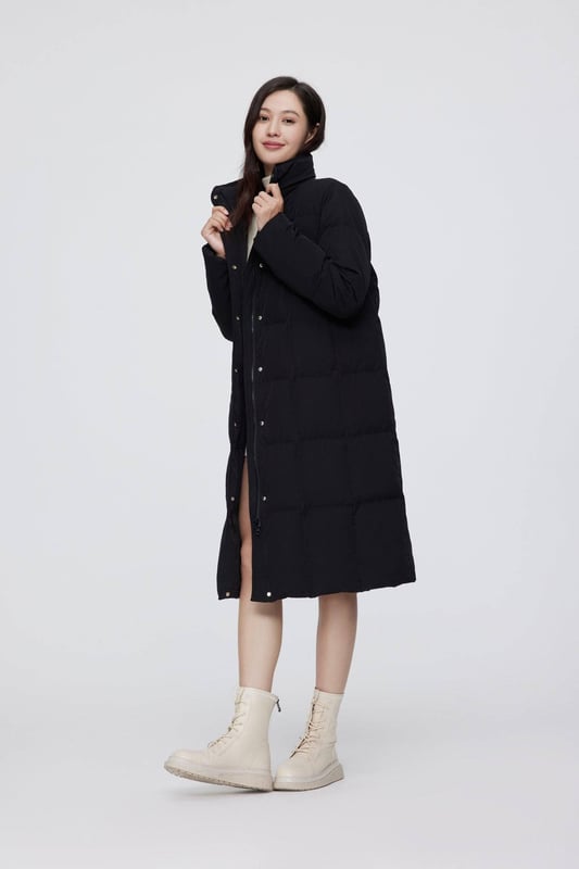 Crafted with premium 680+ quality duck down, this jacket blends elegance with sustainability. Made from eco-friendly, biodegradable fabric—an award-winning choice in sustainable fashion—it features a soft, minimalist hooded design and a detachable scarf for added versatility and warmth.

HIGH QUALITY 680+ DUCK DOWN: 90% filling for optimal warmth, evenly distributed for consistent warmth.

ECO-FRIENDLY TECH FABRIC: Made from eco-friendly SORONA fabric, derived from plants and biodegradable.