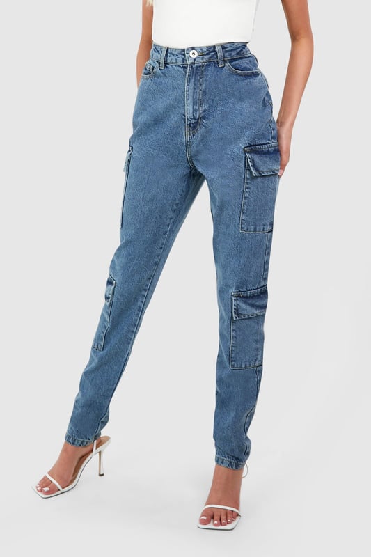 Slim fit cargo jeans designed for taller frames
        Multiple utility pockets for added functionality
        High-rise waist for a flattering silhouette
        Tapered leg design for a modern look
        Versatile denim fabric suitable for various casual occasions
    
    Embrace the fusion of style and practicality with these Tall Basics Slim Cargo Jeans from Boohoo. Perfect for the fashion-forward woman who values both trend and comfort, these jeans offer a contemporary twist on a classic design. The slim fit accentuates your curves while the cargo pockets add an edgy, utilitarian flair. Style them with a crisp white tank top and strappy heels for a chic daytime look, or pair with a slouchy jumper and trainers for a more relaxed vibe. These jeans are ideal for casual outings, from coffee dates to weekend shopping trips. Their versatility makes them a wardrobe staple that can be dressed up or down to suit any casual occasion. The denim fabric ensures durability and ease of care, making these jeans a practical choice for the busy, style-conscious woman.